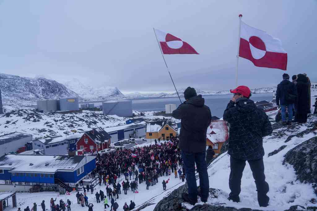 People protest against Trump's policy towards Greenland in front of US consulate in Nuuk, Greenland, Saturday, Jan. 17, 2026.