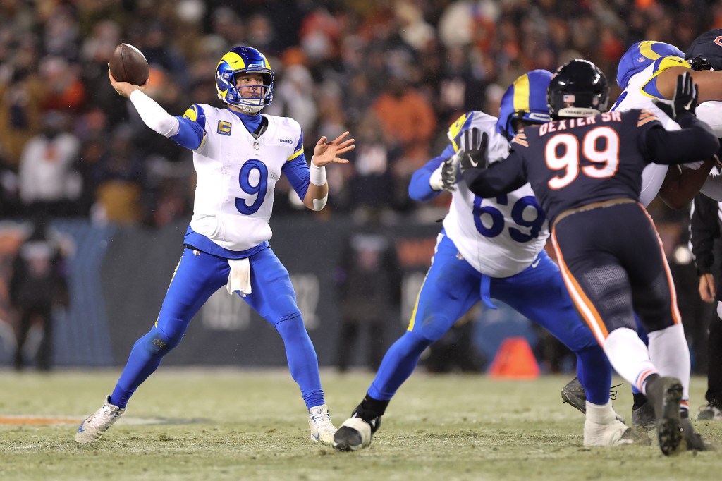 Matthew Stafford #9 of the Los Angeles Rams passes the ball against the Chicago Bears during the fourth quarter in the NFC Divisional Playoffs at Soldier Field on January 18, 2026 in Chicago, Illinois.