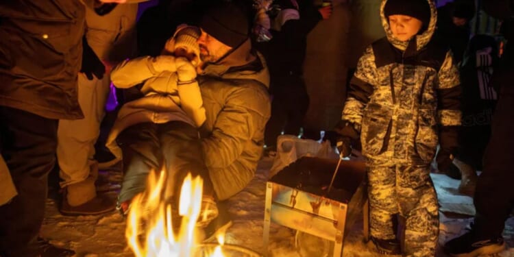 Ukraine apartment buildings left without electricity and heat after Russian attack on Kyiv