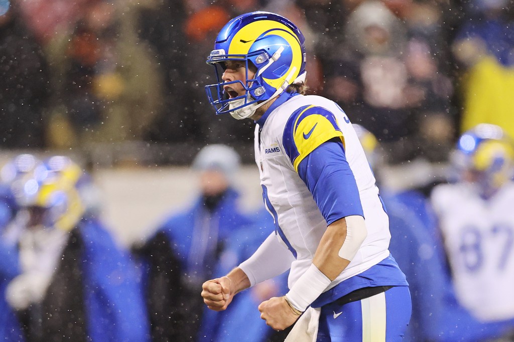 Los Angeles Rams player Matthew Stafford in uniform reacting after a touchdown during the NFC Divisional Playoffs.