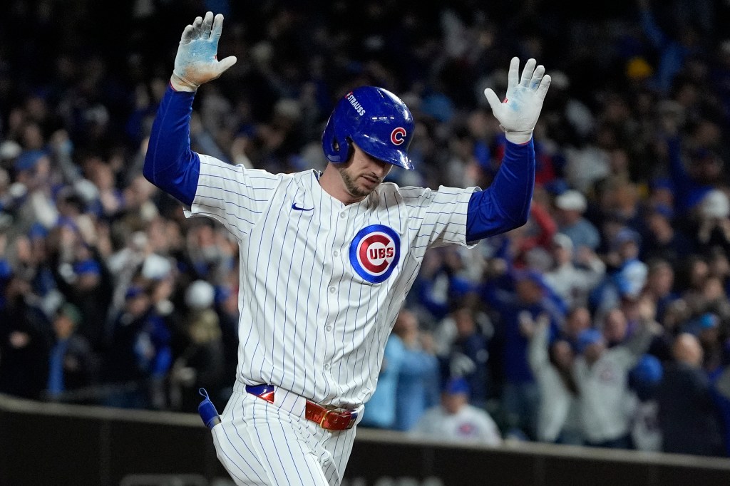 Chicago Cubs right fielder Kyle Tucker (30) reacts after hitting a home run.