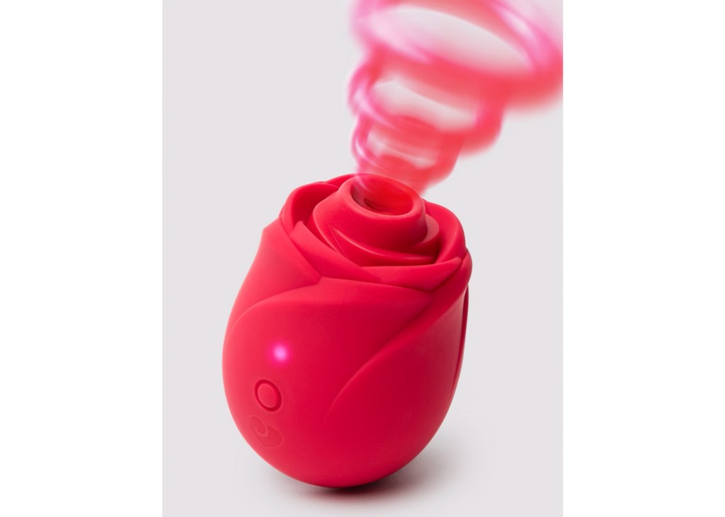 Red rose-shaped toy with a spiral of red light coming out of its center.