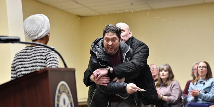 Man Rushes Ilhan Omar At Town Hall, Sprays Her With Unknown Liquid