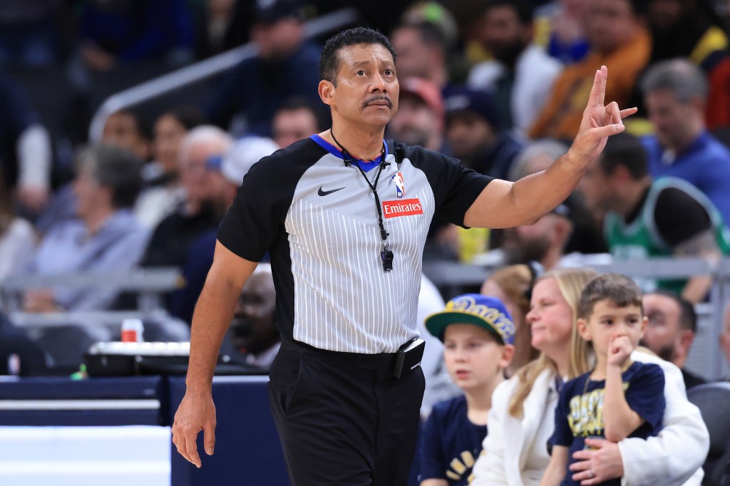 Referee Bill Kennedy makes a call in the game between the Boston Celtics and the Indiana Pacers at Gainbridge Fieldhouse on December 26, 2025 in Indianapolis, Indiana.