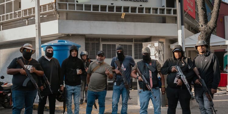 Pro-Maduro Militias Crack Down On Dissent, Search For Supporters Of U.S. Raid