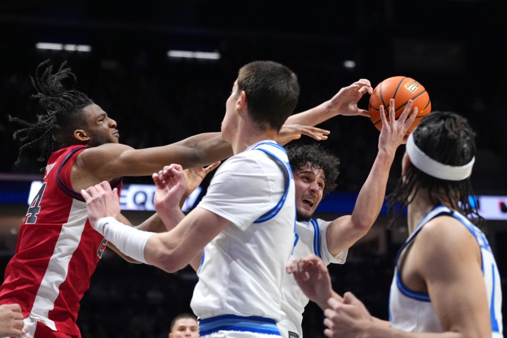 Zuby Ejiofor, battling for a rebound in St. John's win over Xavier, fouled out in the victory, but Rick Pitino thought the officials got four of those calls wrong.