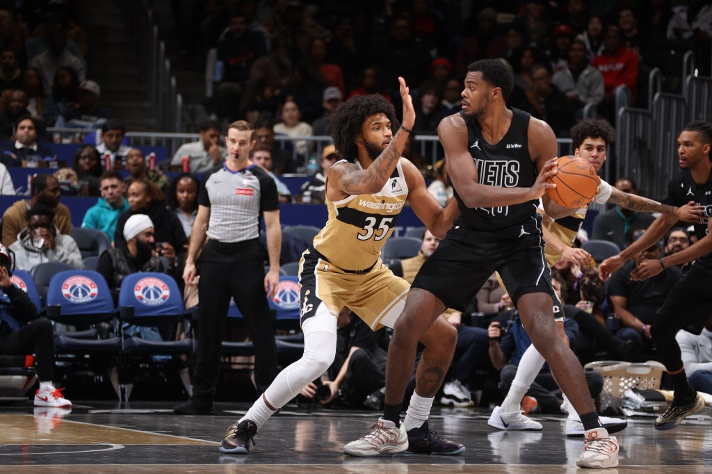 Day'Ron Sharpe #20 of the Brooklyn Nets handles the ball during the game against the Washington Wizards.