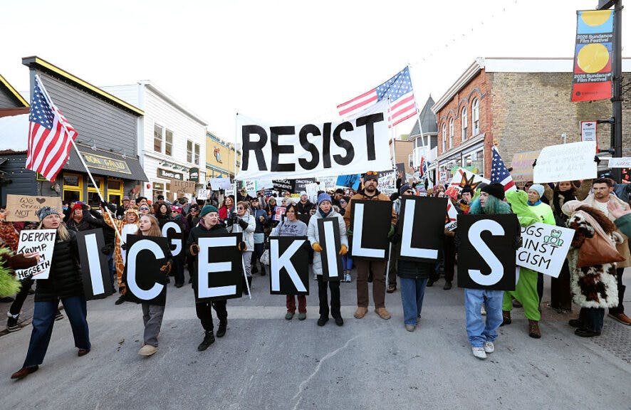 PARK CITY, UTAH - JANUARY 26: Demonstrators protest the United States Immigration and Customs Enforcement (ICE) on Main Street during the 2026 Sundance Film Festival on January 26, 2026 in Park City, Utah. Protests and demonstrations have broken out in multiple cities following the fatal shootings of Renee Good and Alex Pretti by federal agents in Minneapolis. (Photo by Jesse Grant/Getty Images)