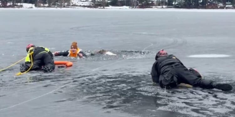 Washington man falls through ice into frigid lake — right in front of cops practicing water rescues