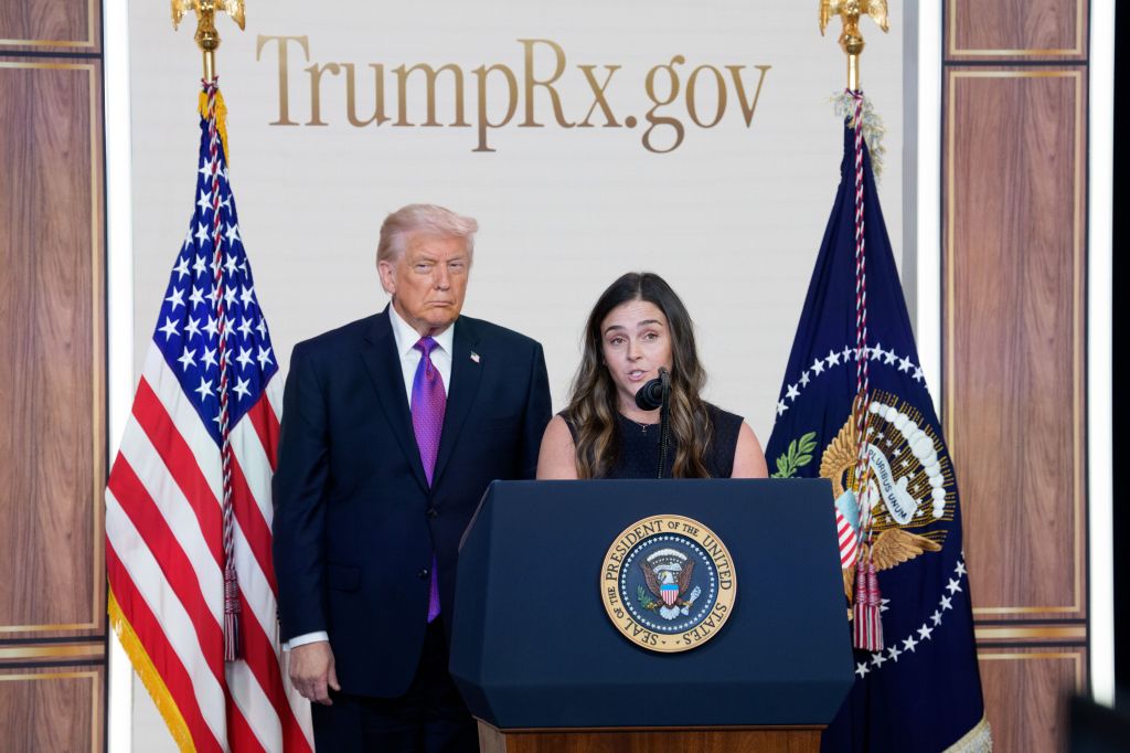 Catherine Rayner speaks alongside President Donald Trump during an event on "TrumpRx" at the Eisenhower Executive Office Building on Feb. 5, 2026.