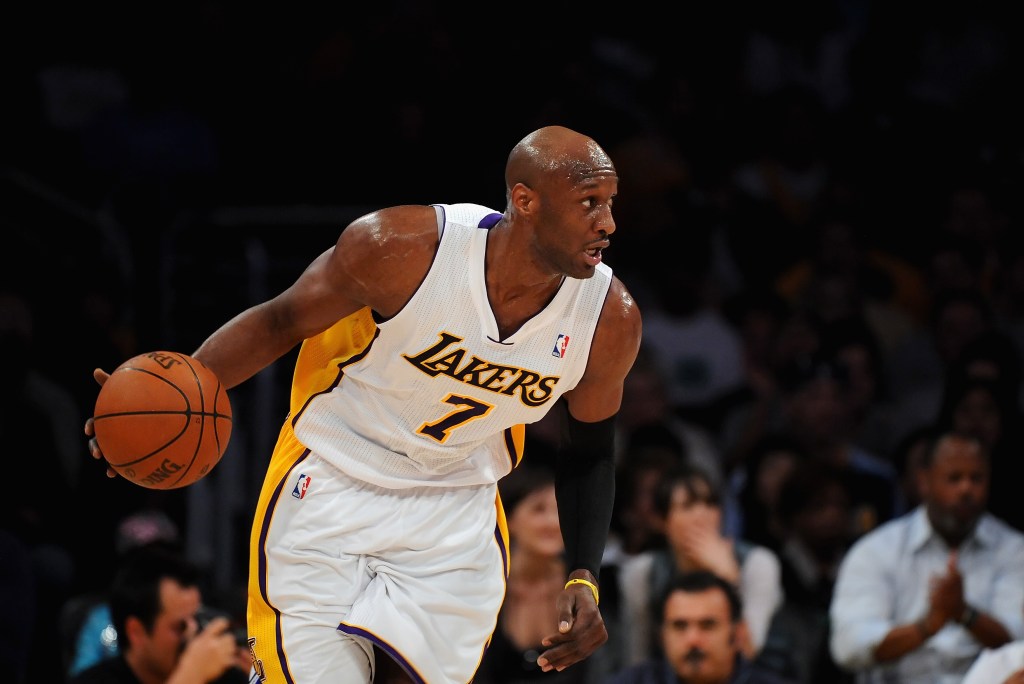 Lamar Odom dribbling the ball while playing for the Los Angeles Lakers.