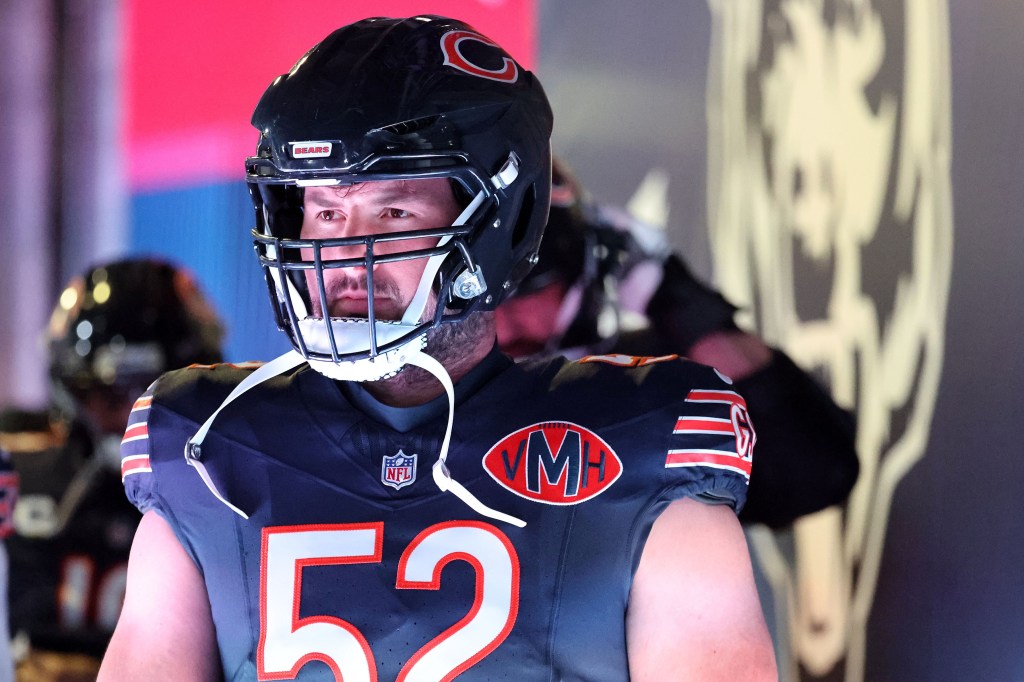 Chicago Bears center Drew Dalman (52) takes the field before the game against the Green Bay Packers at Soldier Field.