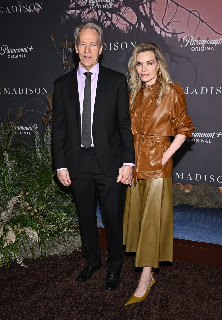 David E. Kelley and Michelle Pfeiffer attend the premiere of "The Madison"
