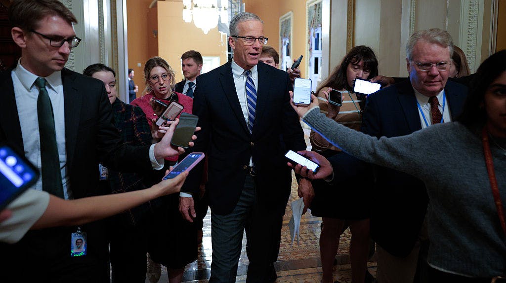 WASHINGTON, DC - MARCH 12: Senate Majority Leader John Thune (R-SD) (C) talks with reporters as he heads for the Senate Chamber at the U.S. Capitol on March 12, 2026 in Washington, DC. Thune is being pressured by conservatives to do away with the 60-vote cloture threshold and move the SAVE America Act forward, a priority for President Donald Trump going into the midterm elections. (Photo by Chip Somodevilla/Getty Images)