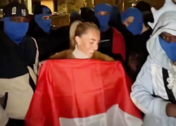 Porn star Bonnie Blue charged after mimicking sex act outside Indonesian embassy in UK