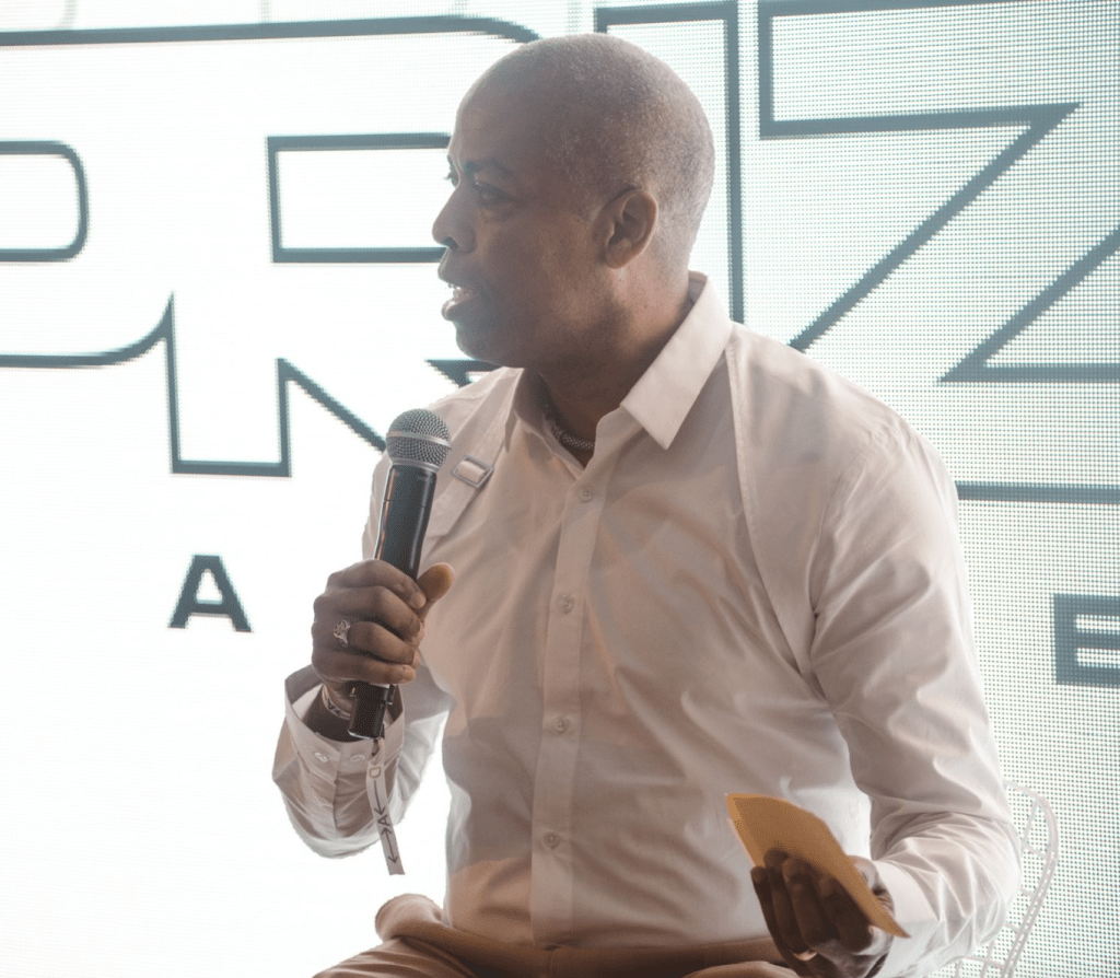 Paul Henderson, director for San Francisco’s Department of Police Accountability, speaking into a microphone.