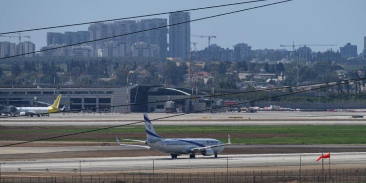 Israel imposes further airport restrictions following weekend missile attacks