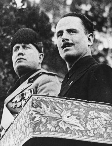 Italian Prime Minister Benito Mussolini (left) and British politician Oswald Mosley, attending a Fascist review celebration in Rome, 1932. (Photo by Keystone/Hulton Archive/Getty Images)