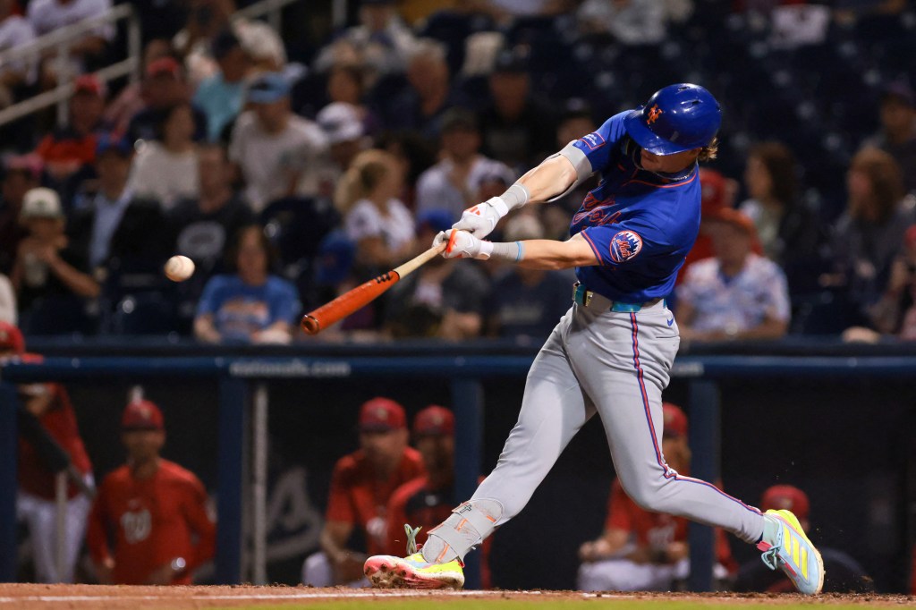 New York Mets right fielder Carson Benge hitting an RBI single against the Washington Nationals.