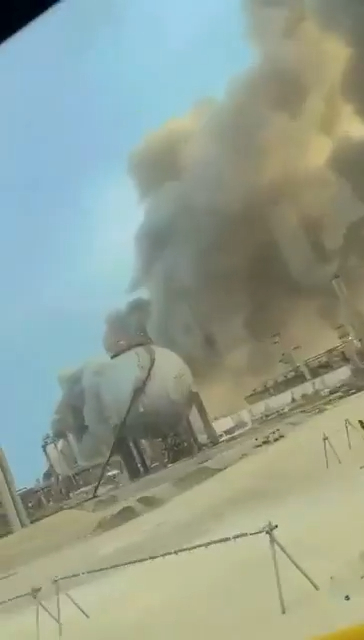 An image shows a massive fire burning at Saudi oil giant Aramco’s facility in Ras Tanura, with thick smoke billowing into the sky.