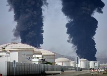 Iranian officials show defiance amid talk of negotiations