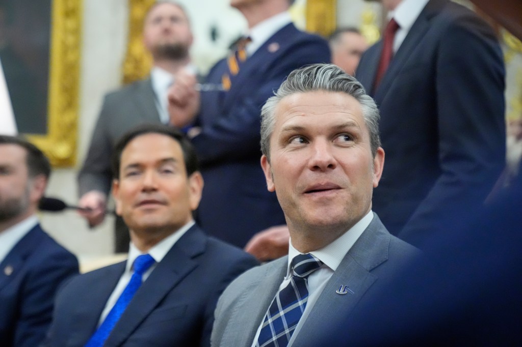 Secretary of State Marco Rubio and Defense Secretary Pete Hegseth attend a meeting with German Chancellor Friedrich Merz and President Donald Trump in the Oval Office at the White House, Tuesday, March 3, 2026.