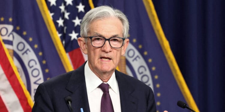 Powell Urges Patience As Fed Holds Rates Steady Amid Iran Conflict