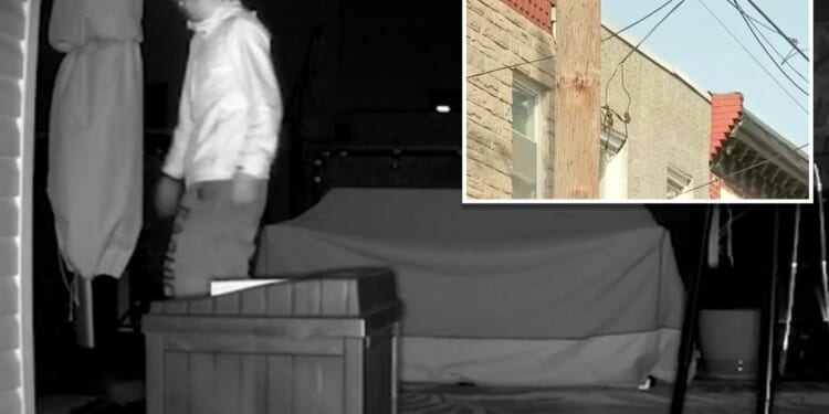Philadelphia masked man spotted on camera lurking on home roof deck