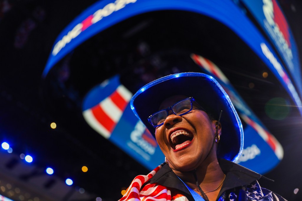 Regina Wallace-Jones of Palo Alto soaking up the first evening of the DNC Convention in Chicago, IL.