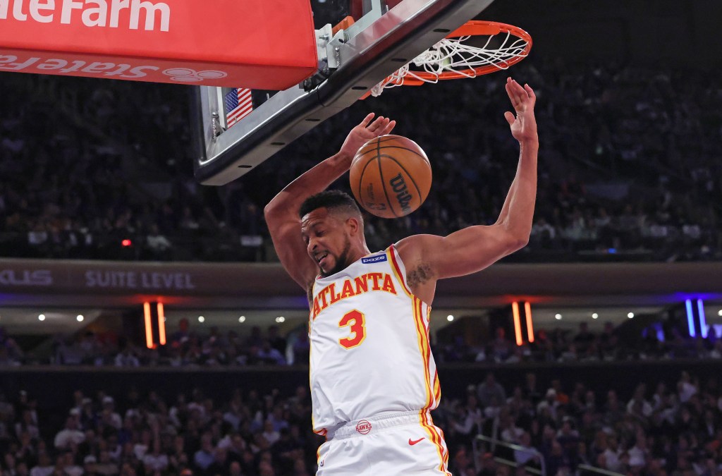 Atlanta Hawks guard CJ McCollum #3 slam the ball during the second quarter.