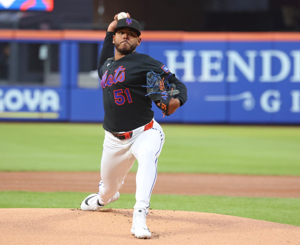 New York Mets pitcher Freddy Peralta (51) pitches in the first inning.