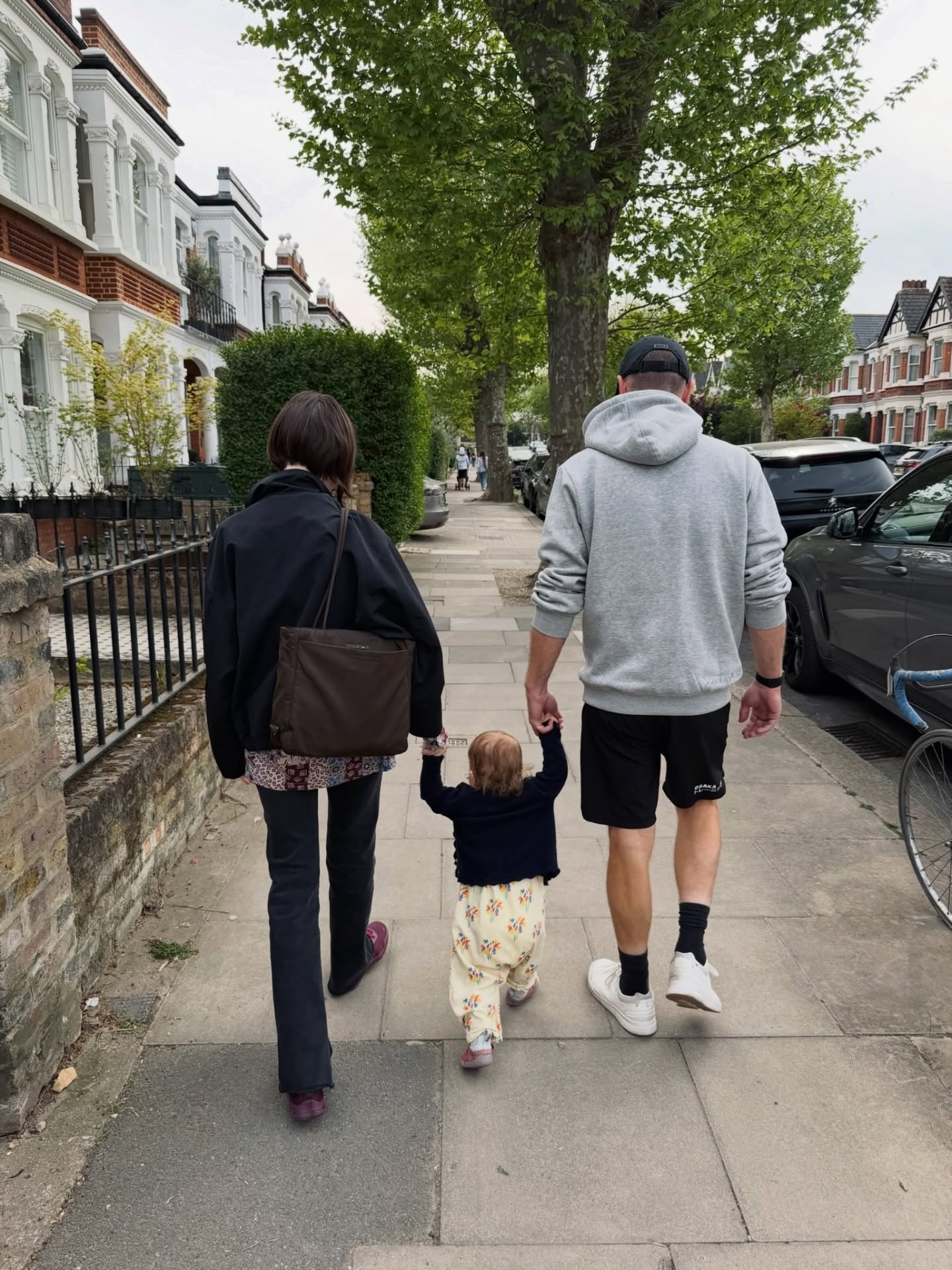 Lily Collins takes her "little flower child" for a "Sunny Sunday stroll."