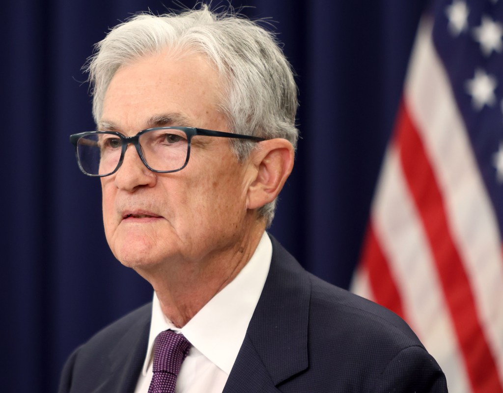 US Federal Reserve Chair Jerome Powell attending a press conference.