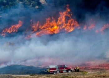 Crews making progress containing Southern California wildfire as some mandatory evacuations remain