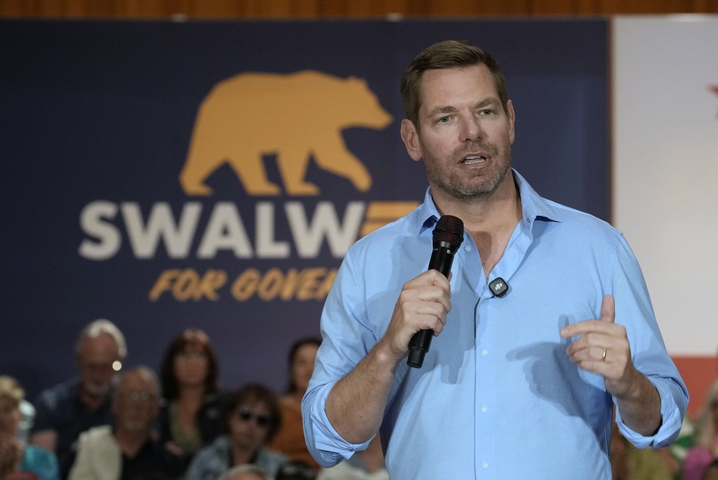 Eric Swalwell speaking at a town hall meeting.