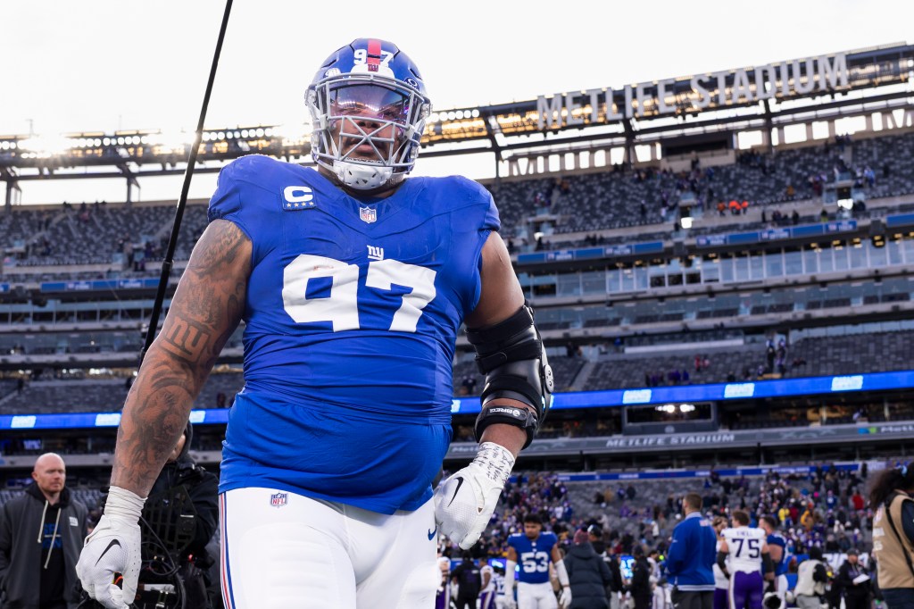 Defensive tackle Dexter Lawrence II #97 of the New York Giants walks off the field at the end of the game at MetLife Stadium, Sunday, Dec. 21, 2025, in East Rutherford, New Jersey.