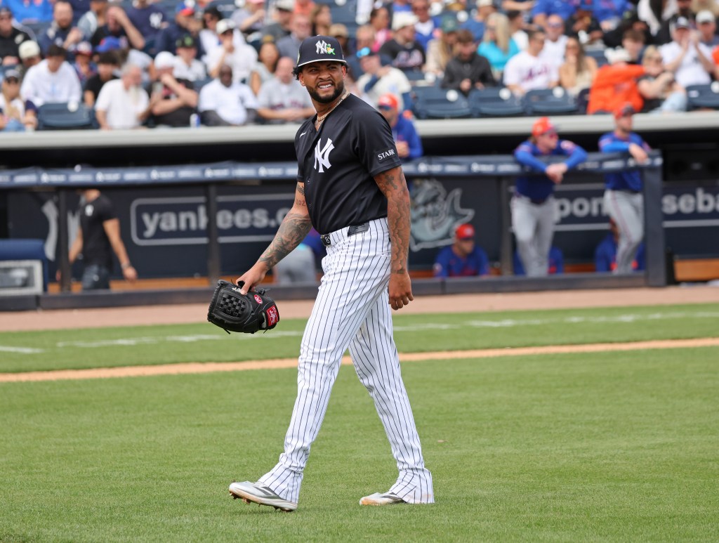 Yankees pitcher Luis Gil #81, walks off the mound after being removed from the game in the 3rd inning.