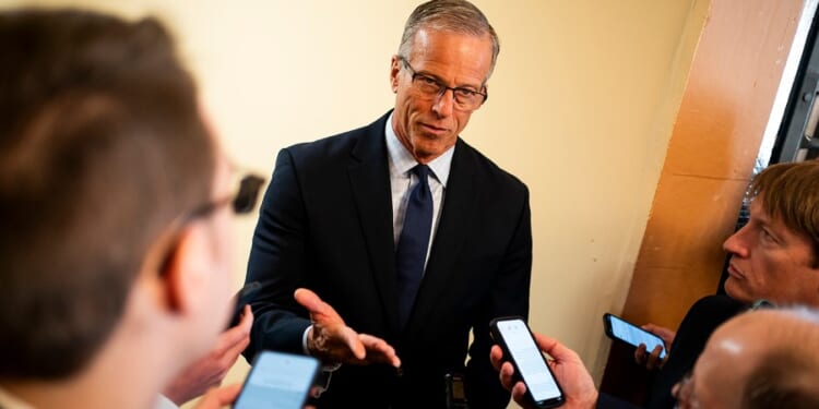 Senate Republicans adopt budget resolution in late-night voting marathon