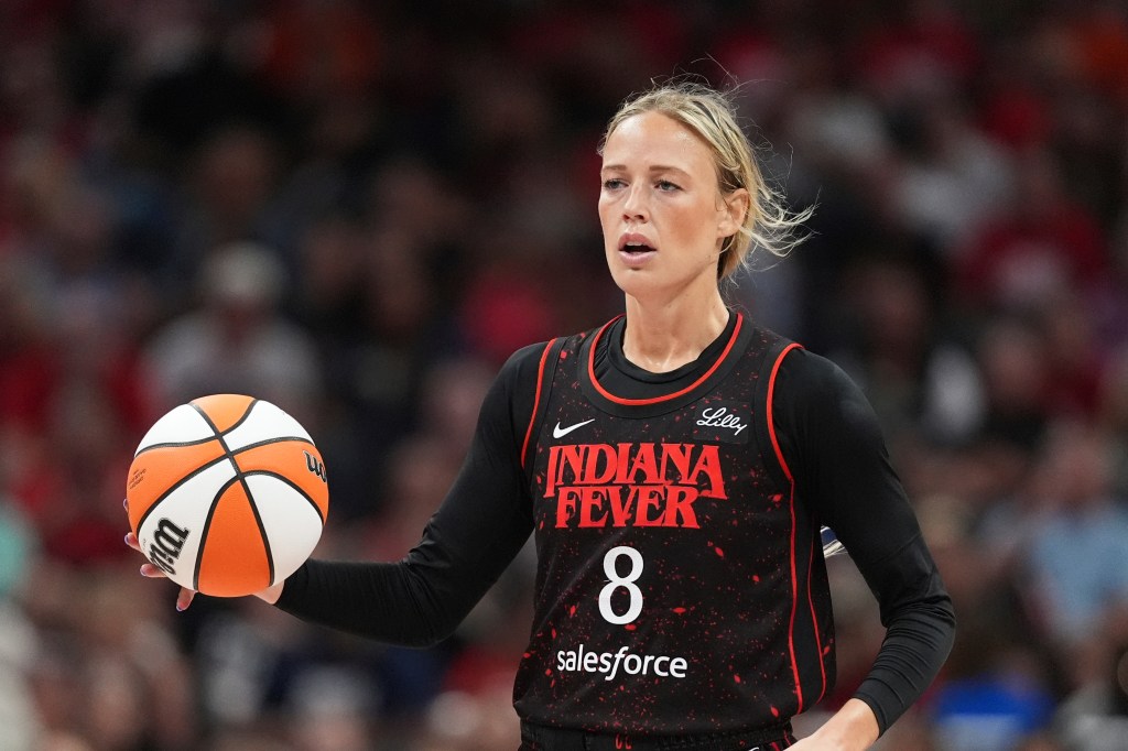 Sophie Cunningham (8) plays against the Dallas Wings in the second half of a WNBA basketball game in Indianapolis, Aug. 12, 2025.