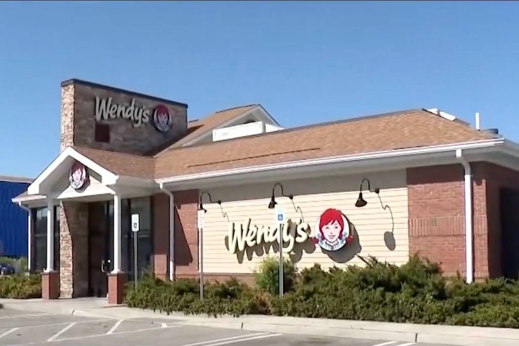 A Wendy's restaurant building on a sunny day.
