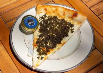Philadelphia pizza shop sells $55 slices topped with caviar, served on gold plate