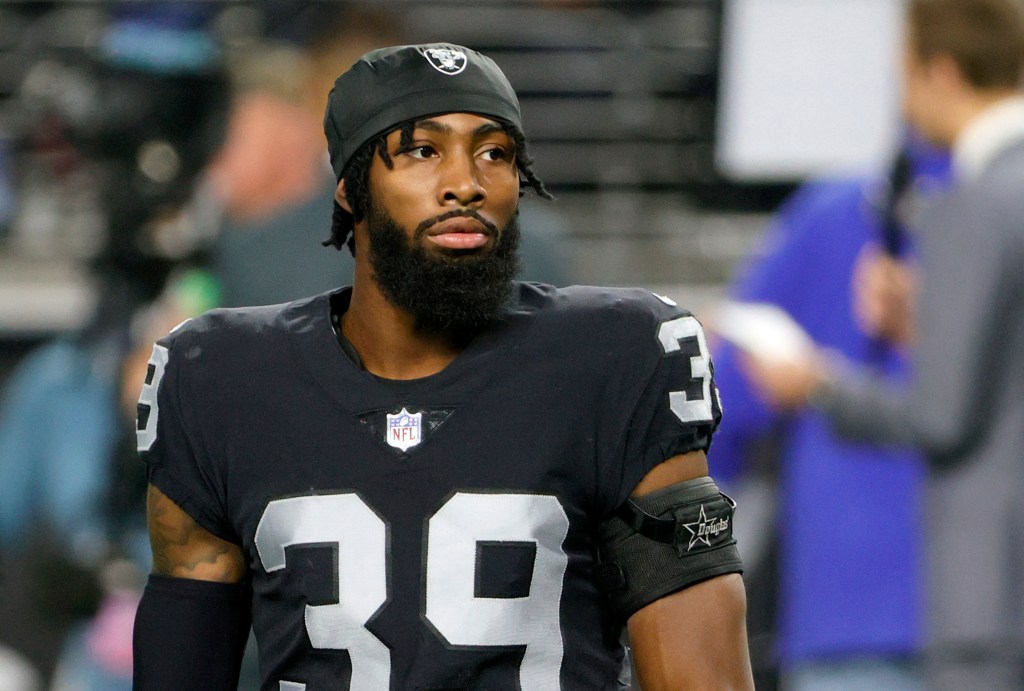 Las Vegas Raiders player Darius Philon wearing a black jersey with the number 39.