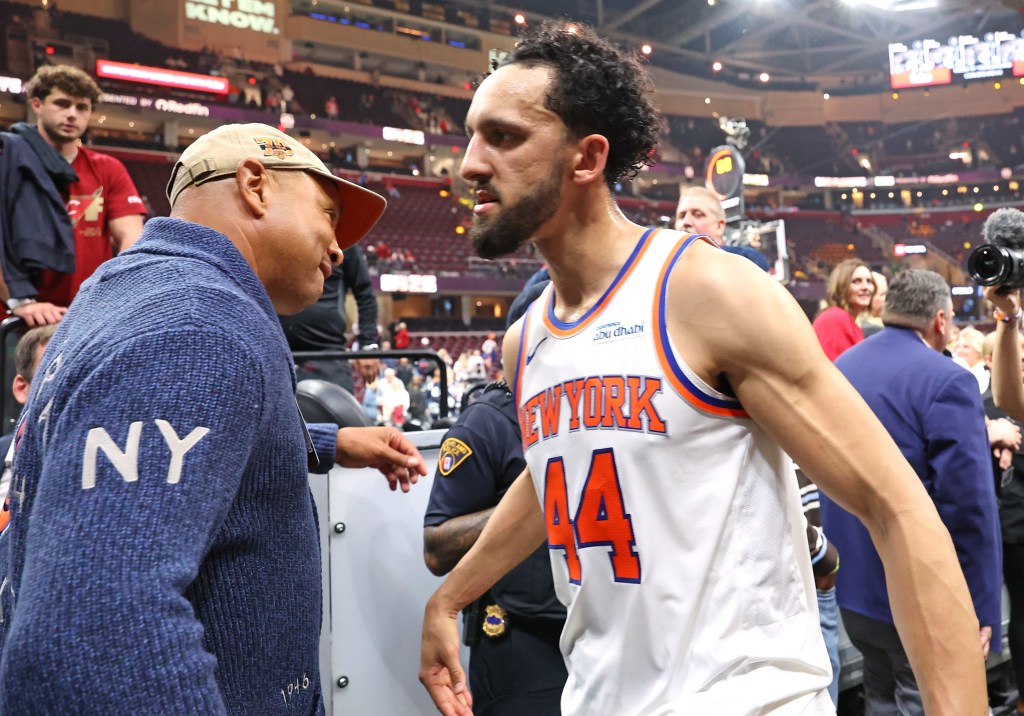 Landry Shamet celebrates with Knicks great John Starks after their 121-108 Game 3 win over the Cavaliers on May 23, 2026 in Cleveland.