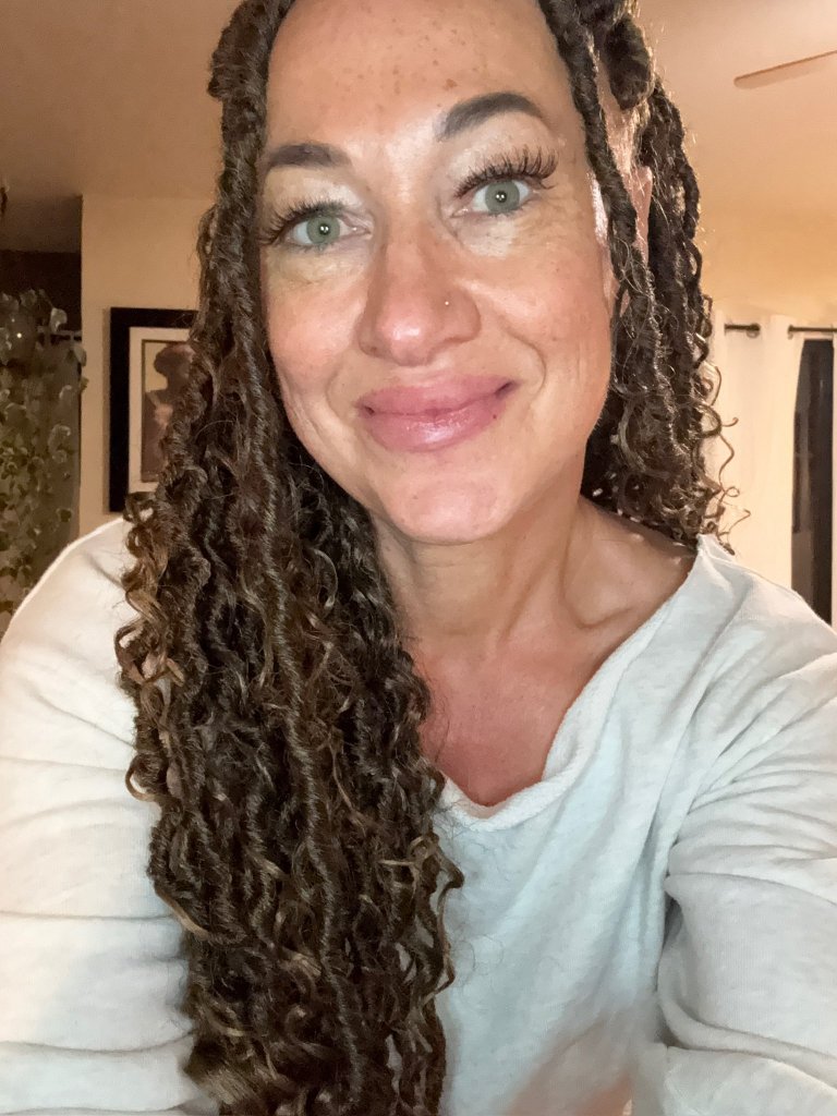 Rachel Dolezal smiling at the camera.