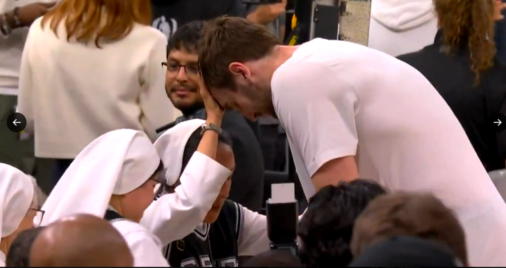 Spurs center Luke Kornet recieved a blessing from the Salesian Sisters of St. John's before the Spurs' 103-82 win over the Thunder. 