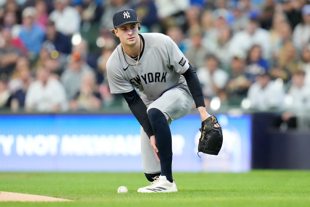 Cam Schlittler holds his left calf after getting struck by a 108.5 mph comebacker in the first inning of the Yankees' 4-3, 10-inning loss to the Brewers on May 9, 2026 in Milwaukee.